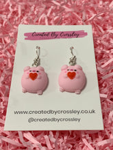 Load image into Gallery viewer, Heart Holding Flirty Pig Charm Earrings