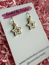 Load image into Gallery viewer, White Outline Star Charm Earrings
