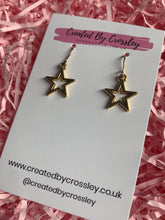 Load image into Gallery viewer, Gold Star Outline Charm Earrings
