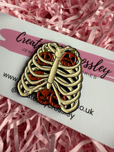 Load image into Gallery viewer, Skeleton Ribcage Pumpkin Pin Badge
