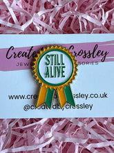 Load image into Gallery viewer, “Still Alive” Rosette Pin Badge
