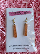 Load image into Gallery viewer, Bronze Shimmer Dangle Resin Earrings
