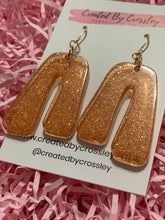 Load image into Gallery viewer, Bronze Shimmer Arch Resin Earrings
