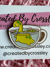 Load image into Gallery viewer, Loch Ness Monster Dinosaur Teacup Pin Badge
