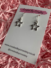 Load image into Gallery viewer, Silver Star Outline Charm Earrings
