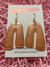 Load image into Gallery viewer, Bronze Shimmer Arch Resin Earrings
