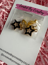 Load image into Gallery viewer, Black Outline Star Clip On Earrings
