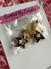 Load image into Gallery viewer, Black Outline Star Clip On Earrings
