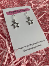 Load image into Gallery viewer, Silver Star Outline Charm Earrings
