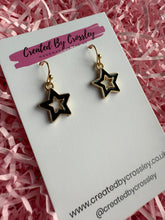 Load image into Gallery viewer, Black Outline Star Charm Earrings
