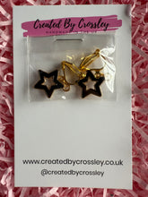Load image into Gallery viewer, Black Outline Star Clip On Earrings

