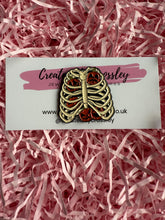 Load image into Gallery viewer, Skeleton Ribcage Pumpkin Pin Badge
