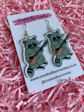 Load image into Gallery viewer, Guitar Raccoon Charm Earrings
