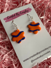 Load image into Gallery viewer, Orange Blue Flower Clay Earrings
