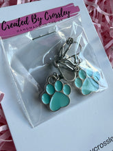 Load image into Gallery viewer, Light Blue Paw Print Clip On Earrings
