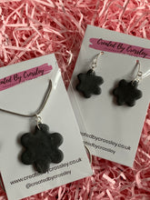 Load image into Gallery viewer, Dark Grey Flower Clay Earrings and Necklace
