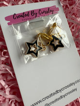 Load image into Gallery viewer, Black Outline Star Clip On Earrings
