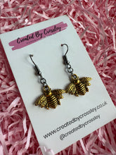 Load image into Gallery viewer, Gunmetal and Gold Bee Charm Earrings
