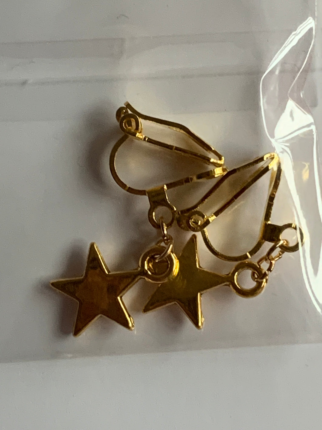 Gold Star Clip On Earrings