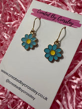 Load image into Gallery viewer, Light Blue Daisy Charm Earrings
