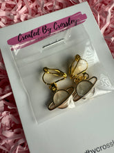 Load image into Gallery viewer, White Planet Clip On Earrings
