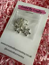 Load image into Gallery viewer, Star Outline Clip On Earrings
