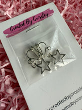 Load image into Gallery viewer, Star Outline Clip On Earrings
