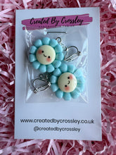 Load image into Gallery viewer, Blue Happy Flower Clip On Earrings
