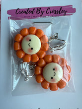 Load image into Gallery viewer, Orange Happy Flower Clip On Earrings
