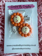 Load image into Gallery viewer, Orange Happy Flower Clip On Earrings
