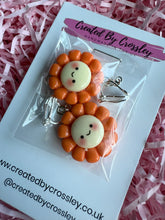 Load image into Gallery viewer, Orange Happy Flower Clip On Earrings
