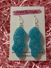 Load image into Gallery viewer, Blue Sparkle Squiggle Resin Earrings
