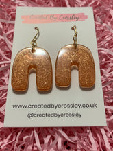 Load image into Gallery viewer, Bronze Shimmer Arch Resin Earrings
