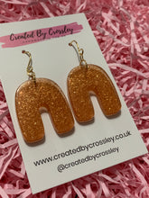 Load image into Gallery viewer, Bronze Shimmer Arch Resin Earrings
