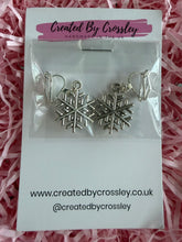 Load image into Gallery viewer, Snowflake Clip On Earrings
