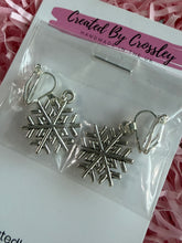 Load image into Gallery viewer, Snowflake Clip On Earrings
