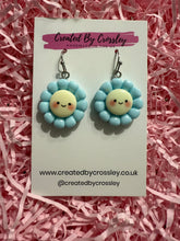 Load image into Gallery viewer, Blue Happy Flower Charm Earrings
