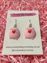 Load image into Gallery viewer, Heart Holding Flirty Pig Charm Earrings
